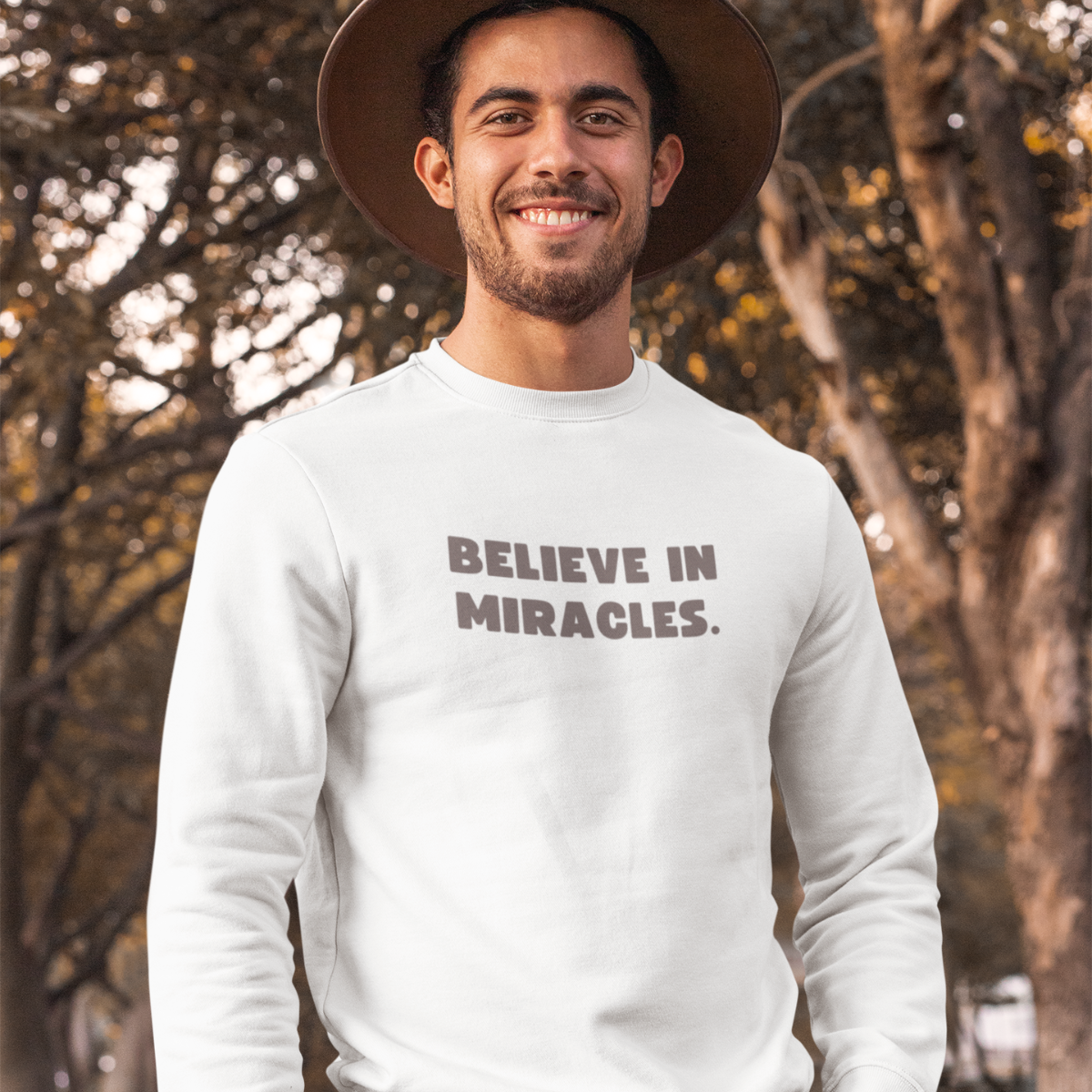 White inspirational Believe in Miracles apparel